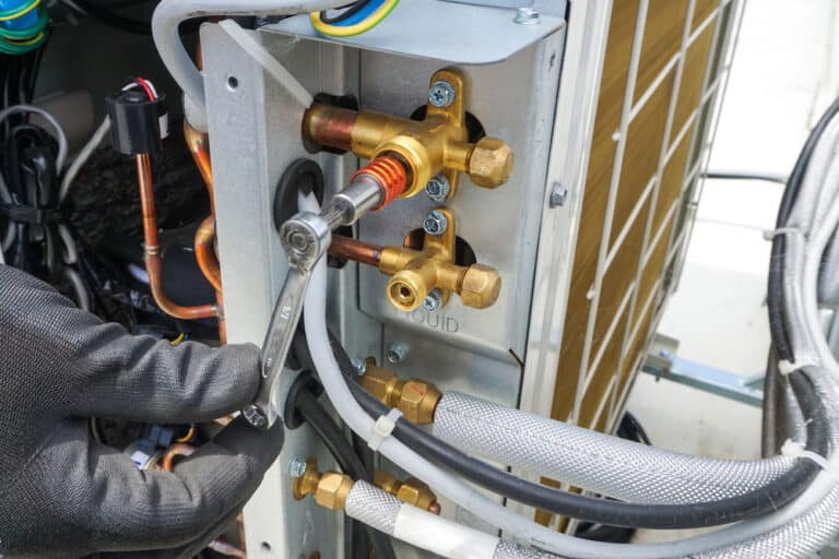 Servicing An Air Conditioning Unit For Gas Leaks