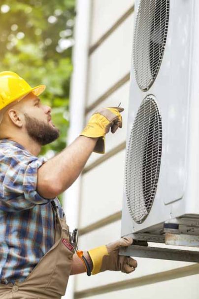 Male Technician Repairing Air Conditioner — Air Conditioning for Home & Business Taylors Beach, NSW